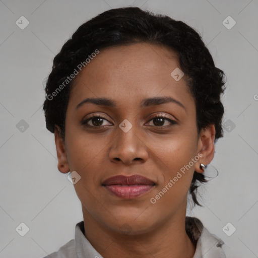 Joyful black young-adult female with short  brown hair and brown eyes