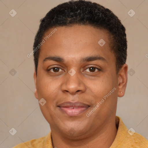 Joyful black young-adult male with short  brown hair and brown eyes