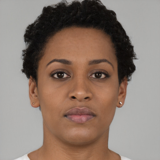 Neutral black young-adult female with short  brown hair and brown eyes