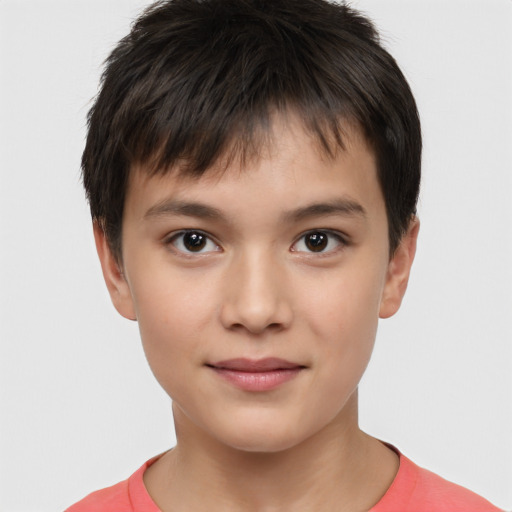 Joyful white child male with short  brown hair and brown eyes