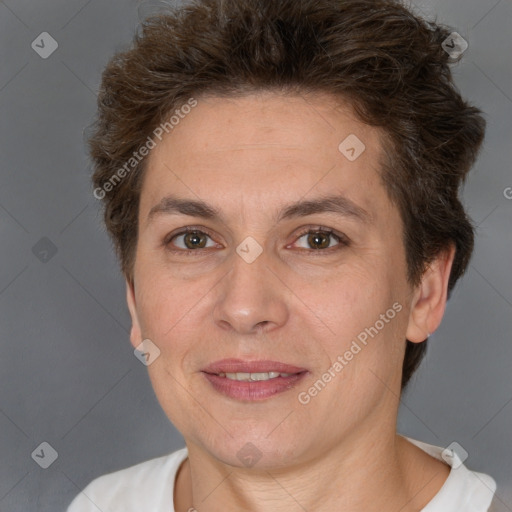 Joyful white adult female with short  brown hair and brown eyes