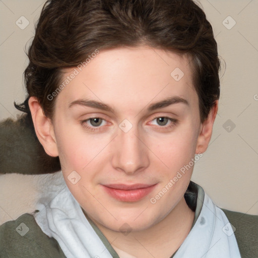 Joyful white young-adult female with short  brown hair and blue eyes