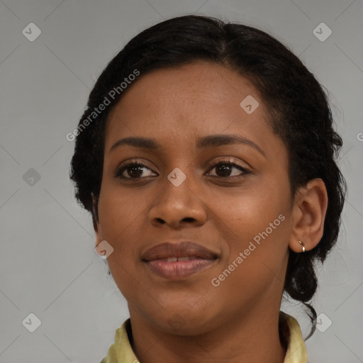 Joyful black young-adult female with medium  brown hair and brown eyes