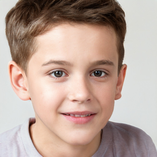 Joyful white child male with short  brown hair and brown eyes