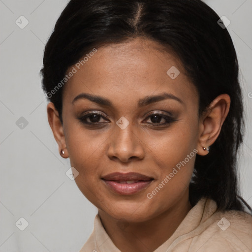 Joyful black young-adult female with medium  brown hair and brown eyes