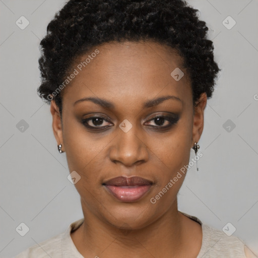 Joyful black young-adult female with short  black hair and brown eyes