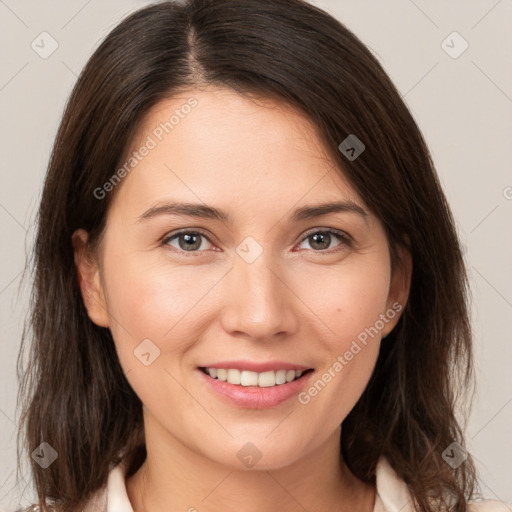 Joyful white young-adult female with medium  brown hair and brown eyes