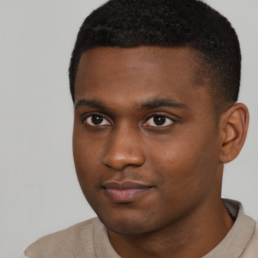 Neutral black young-adult male with short  brown hair and brown eyes