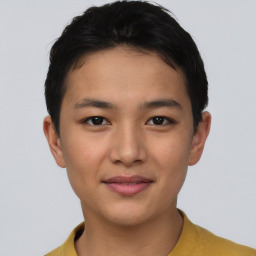 Joyful asian young-adult female with short  black hair and brown eyes