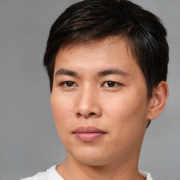 Neutral asian young-adult male with short  brown hair and brown eyes