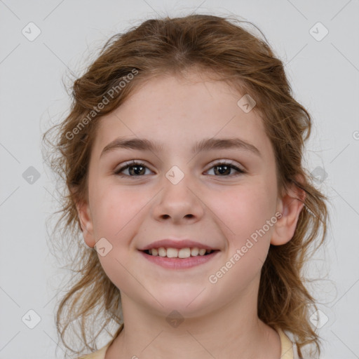 Joyful white child female with medium  brown hair and brown eyes