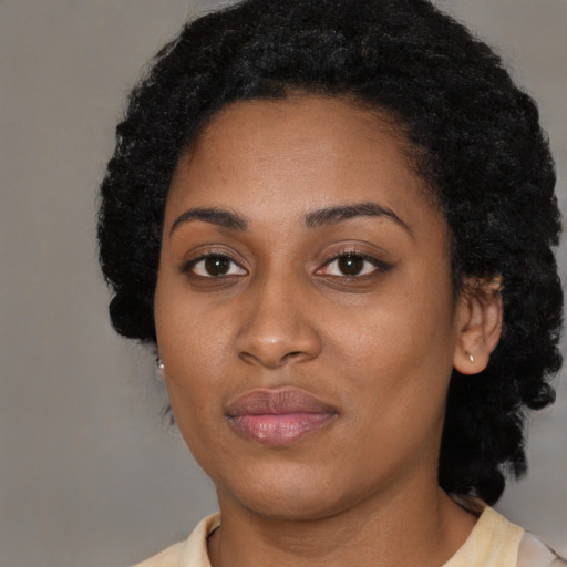 Neutral latino young-adult female with short  black hair and brown eyes
