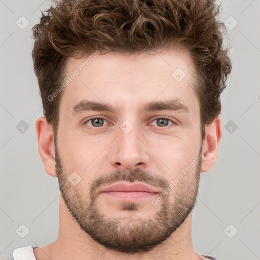 Neutral white young-adult male with short  brown hair and grey eyes