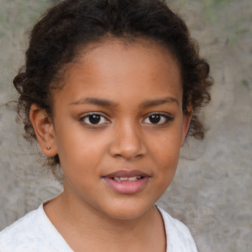 Joyful black child female with short  brown hair and brown eyes