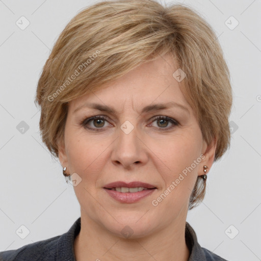 Joyful white adult female with medium  brown hair and grey eyes