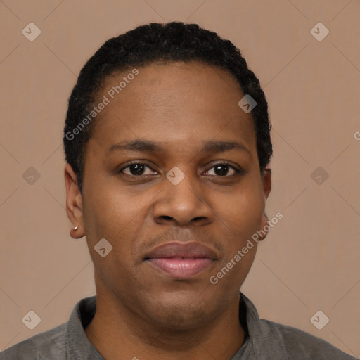 Joyful black young-adult male with short  black hair and brown eyes