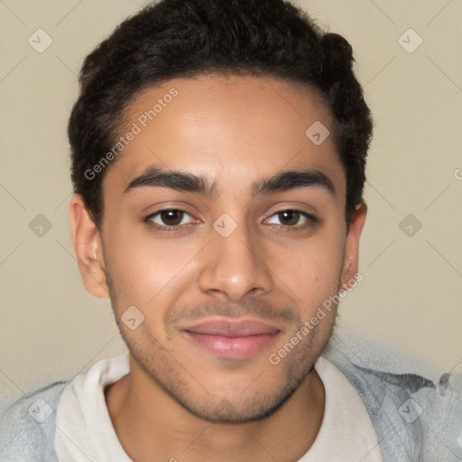 Joyful latino young-adult male with short  brown hair and brown eyes