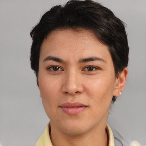 Joyful white young-adult female with short  brown hair and brown eyes