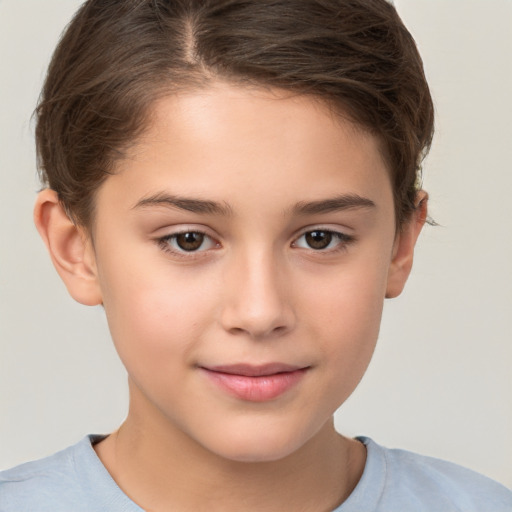 Joyful white child female with short  brown hair and brown eyes