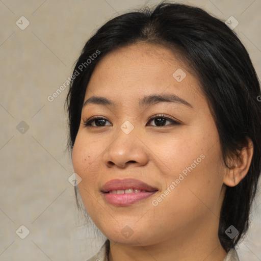 Joyful asian young-adult female with medium  black hair and brown eyes