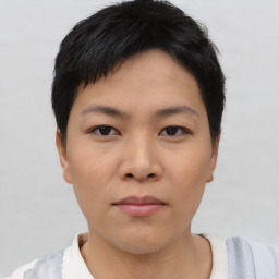 Neutral asian young-adult female with short  brown hair and brown eyes