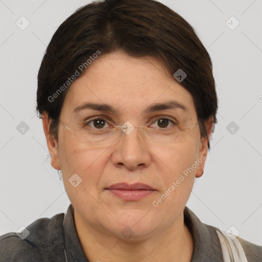 Joyful white adult female with short  brown hair and brown eyes