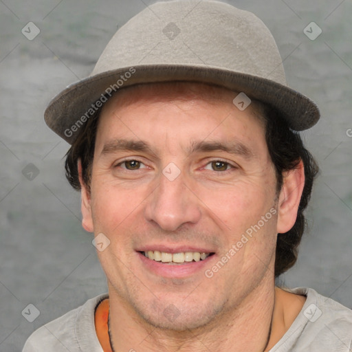 Joyful white adult male with short  brown hair and grey eyes