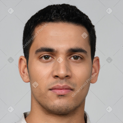 Neutral latino young-adult male with short  black hair and brown eyes