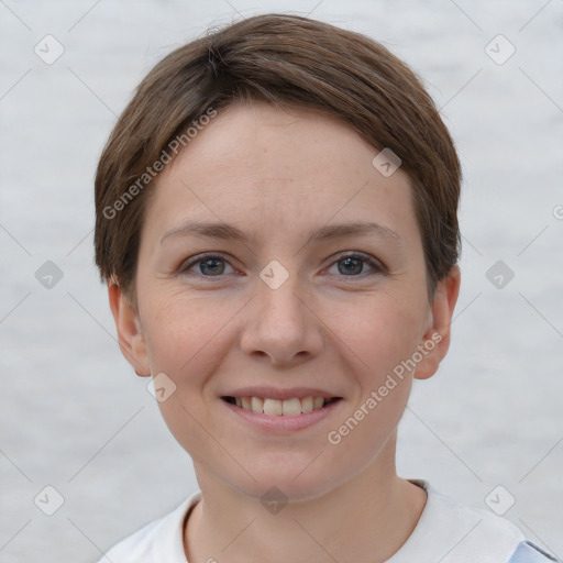 Joyful white young-adult female with short  brown hair and grey eyes