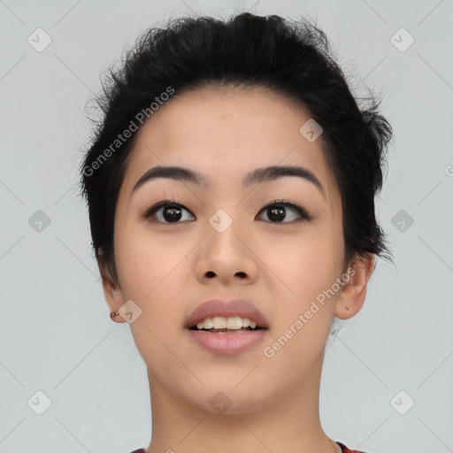 Joyful asian young-adult female with short  black hair and brown eyes