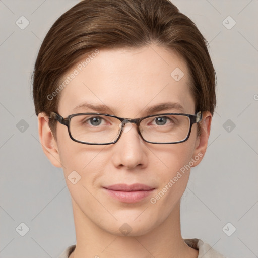 Joyful white young-adult female with short  brown hair and grey eyes