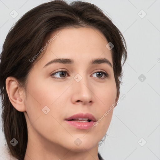 Neutral white young-adult female with medium  brown hair and brown eyes