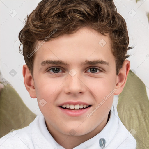 Joyful white child male with short  brown hair and brown eyes