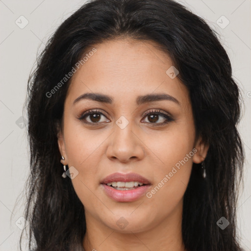 Joyful latino young-adult female with long  brown hair and brown eyes