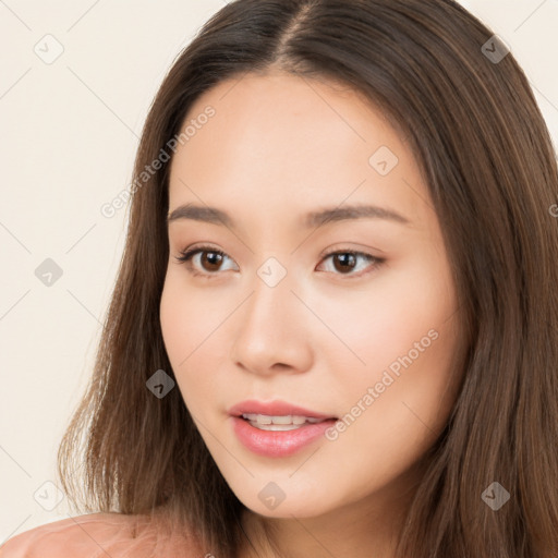 Neutral white young-adult female with long  brown hair and brown eyes