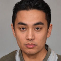 Neutral white young-adult male with short  black hair and brown eyes