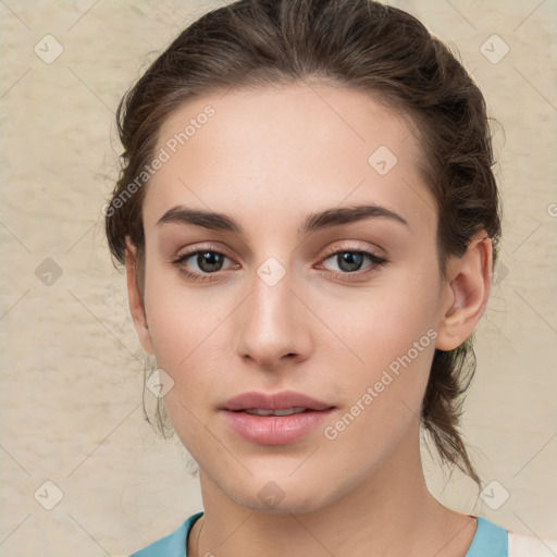 Neutral white young-adult female with medium  brown hair and brown eyes