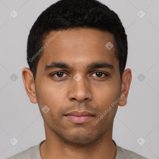 Neutral latino young-adult male with short  black hair and brown eyes