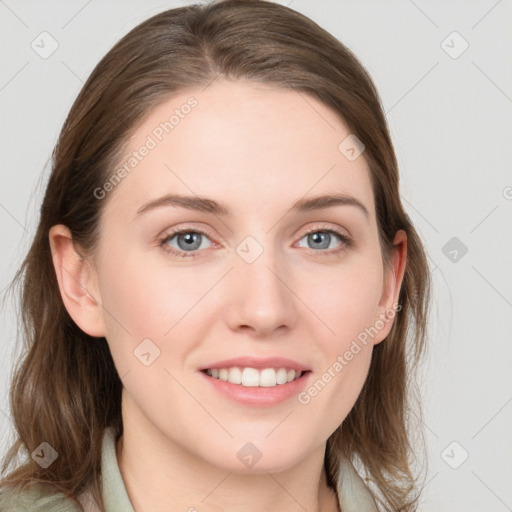 Joyful white young-adult female with medium  brown hair and blue eyes