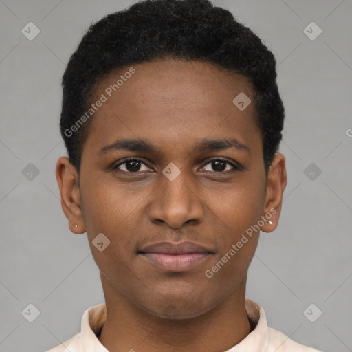 Joyful black young-adult male with short  brown hair and brown eyes