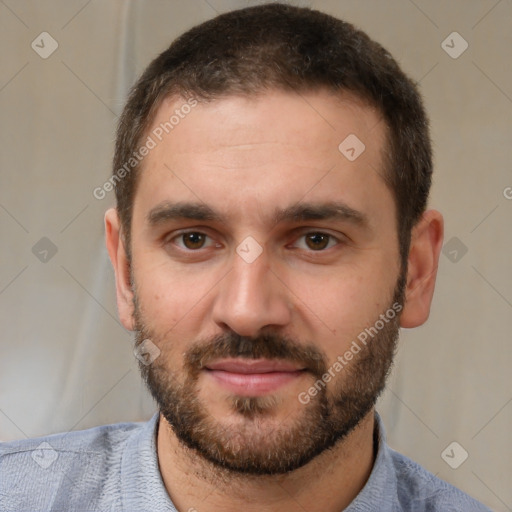 Joyful white young-adult male with short  brown hair and brown eyes