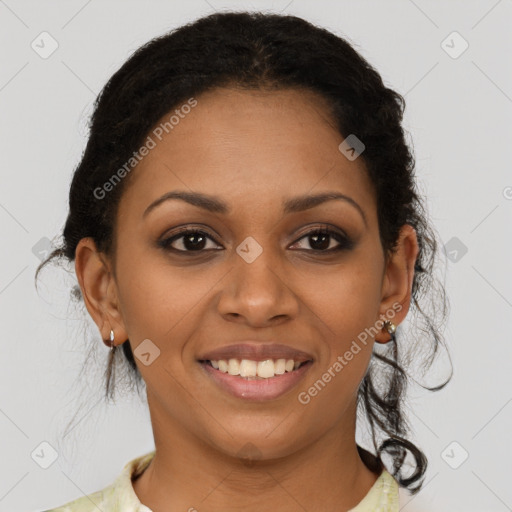 Joyful black young-adult female with medium  brown hair and brown eyes