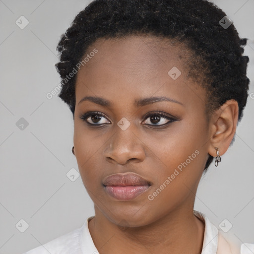 Neutral black young-adult female with short  black hair and brown eyes