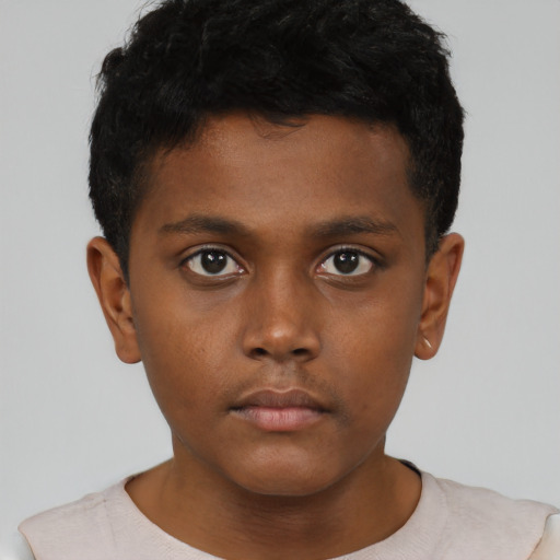Neutral black child male with short  brown hair and brown eyes