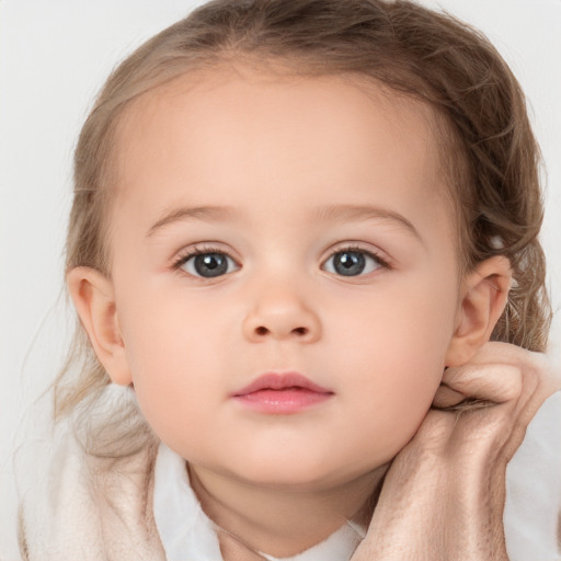 Neutral white child female with medium  brown hair and blue eyes