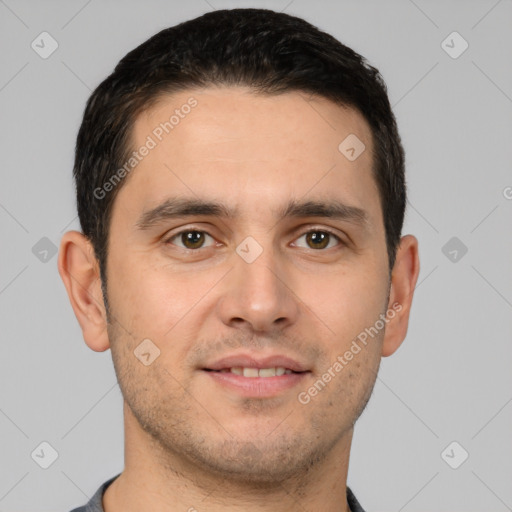 Joyful white young-adult male with short  brown hair and brown eyes