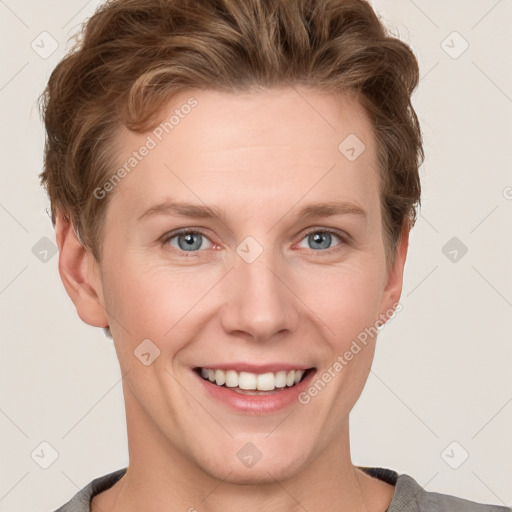 Joyful white young-adult female with short  brown hair and grey eyes