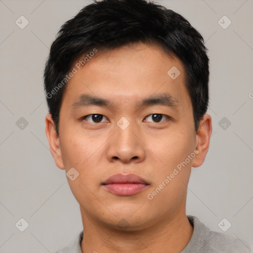 Neutral asian young-adult male with short  black hair and brown eyes