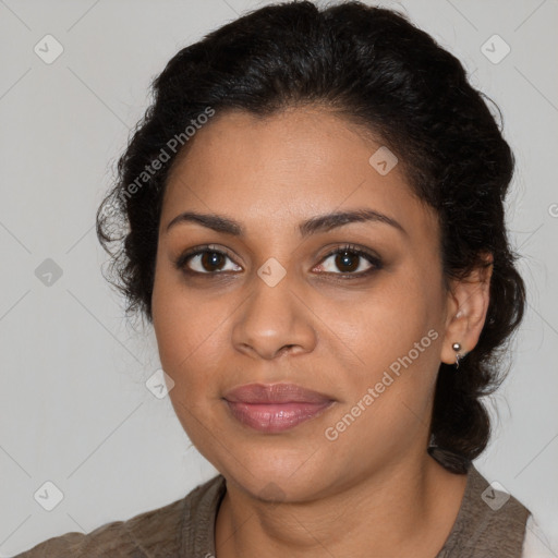 Joyful latino young-adult female with medium  brown hair and brown eyes