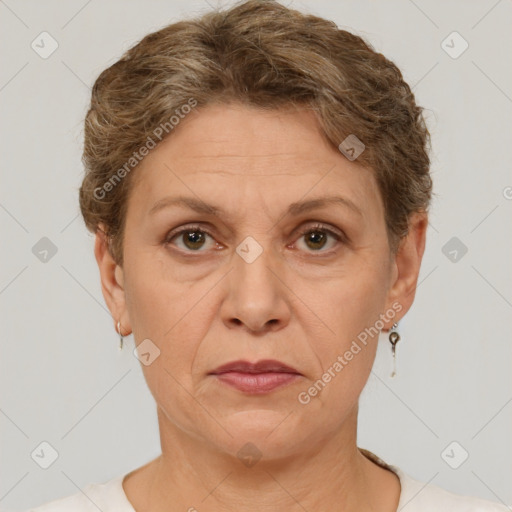 Joyful white adult female with short  brown hair and brown eyes